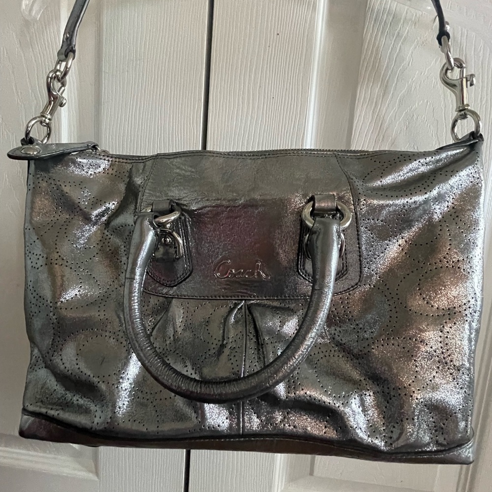 Coach metallic hand bag but also has shoulder strap !